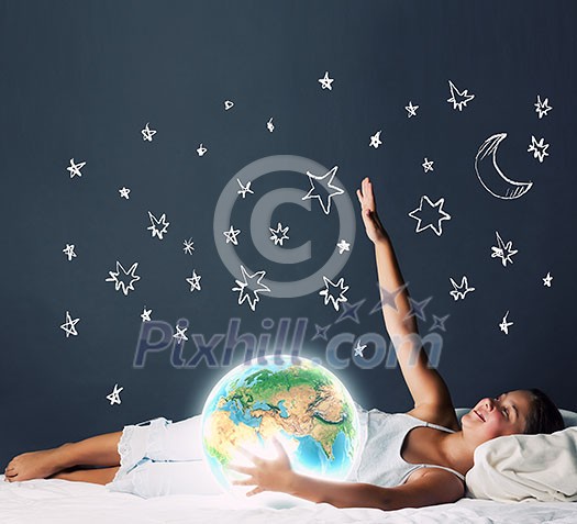 Cute girl sleeping in bed and looking at Earth planet. Elements of this image are furnished by NASA Cute girl sleeping in bed and looking at Earth planet. Elements of this image are furnished by NASA
