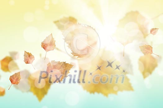 Conceptual image with colorful leaves flying in air