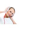 Pretty, young woman listening to her favorite music on hi-fi headphones, dancing, enjoying the tune, having a moment for herself