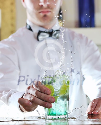 pro barman prepare coctail drink and representing nightlife and party event concept pro barman prepare coctail drink and representing nightlife and party event concept
