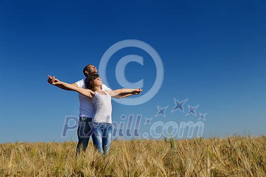 happy young couple in love have romance and fun at wheat field in summer happy young couple in love have romance and fun at wheat field in summer