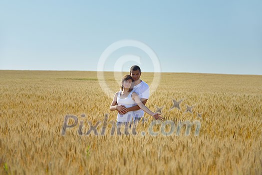 happy young couple in love have romance and fun at wheat field in summer happy young couple in love have romance and fun at wheat field in summer
