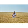 happy young couple in love have romance and fun at wheat field in summer