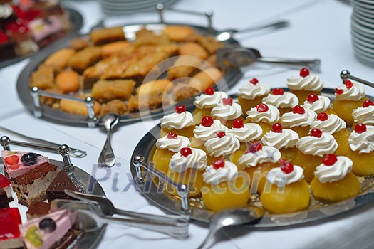 people group catering buffet food indoor in luxury restaurant with meat colorful fruits and vegetables people group catering buffet food indoor in luxury restaurant with meat colorful fruits and vegetables