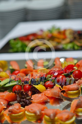 people group catering buffet food indoor in luxury restaurant with meat colorful fruits  and vegetables