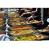 people group catering buffet food indoor in luxury restaurant with meat colorful fruits  and vegetables