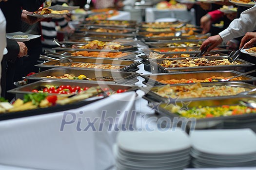 people group catering buffet food indoor in luxury restaurant with meat colorful fruits  and vegetables