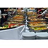 people group catering buffet food indoor in luxury restaurant with meat colorful fruits  and vegetables