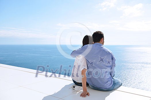 romantic happy young couple relax at modern home outdoors