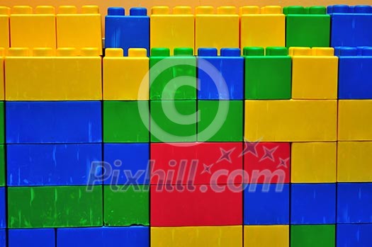 colorful brick toy background in child playground colorful brick toy background in child playground