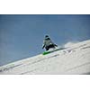 snowboard woman racing downhill slope and freeride on powder snow at winter season and sunny day