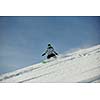 snowboard woman racing downhill slope and freeride on powder snow at winter season and sunny day