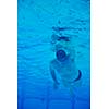 sport swimming pool  underwater with blue color and swimmers