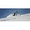 snowboard woman racing downhill slope and freeride on powder snow at winter season and sunny day