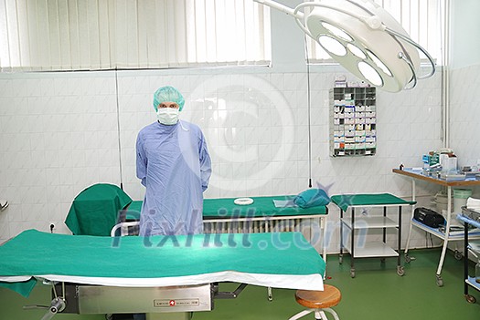 surgeon in surgery room surgeon in surgery room