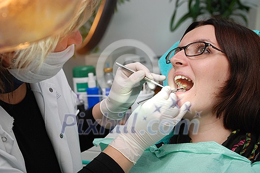 girl on dentist chair girl on dentist chair