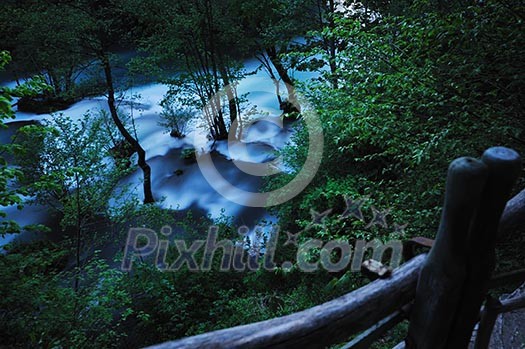 beautiful nature scene with river and waterfall at spring seasson beautiful nature scene with river and waterfall at spring seasson