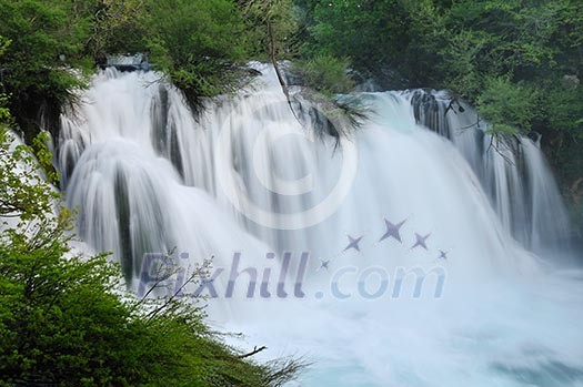beautiful nature scene with river and waterfall at spring seasson beautiful nature scene with river and waterfall at spring seasson