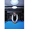 young pro billiard player finding best solution and right angle at billard or snooker pool sport  game 