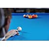 young pro billiard player finding best solution and right angle at billard or snooker pool sport  game 