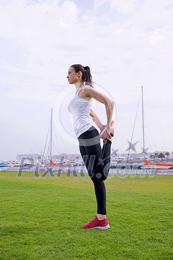 Young beautiful woman jogging and running on morning at park in the city. Woman in sport outdoors health and fitness concept Young beautiful woman jogging and running on morning at park in the city. Woman in sport outdoors health and fitness concept