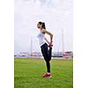 Young beautiful  woman jogging and running  on morning at  park in the city. Woman in sport outdoors health and fitness concept