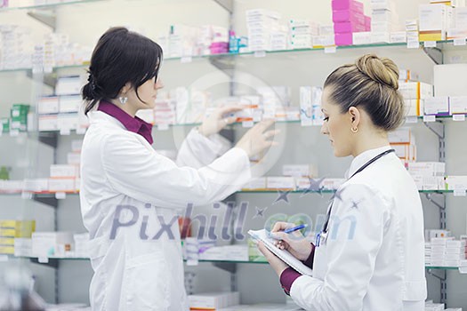 team of pharmacist chemist woman group standing in pharmacy drugstore team of pharmacist chemist woman group standing in pharmacy drugstore