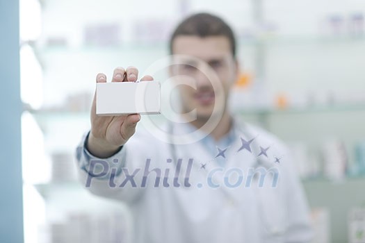 portrait of handsome young pharmacist chemist man standing in pharmacy drugstore portrait of handsome young pharmacist chemist man standing in pharmacy drugstore