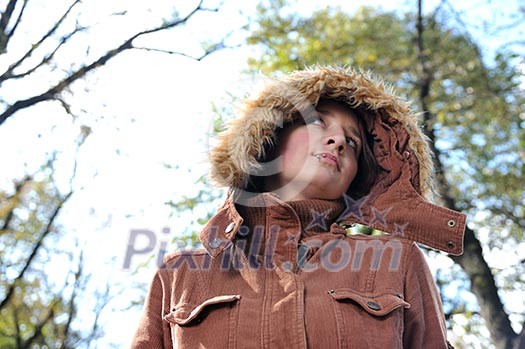 brunette Cute young woman with piercing posing outdoors in nature brunette Cute young woman with piercing posing outdoors in nature