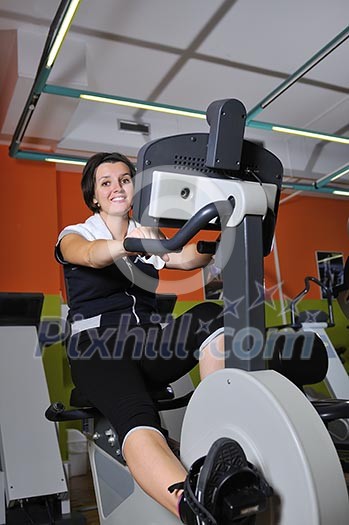 Young woman working out in fitness Young woman working out in fitness