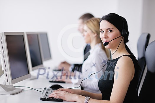 business people group with headphones giving support in help desk office to customers, manager giving training and education instructions business people group with headphones giving support in help desk office to customers, manager giving training and education instructions