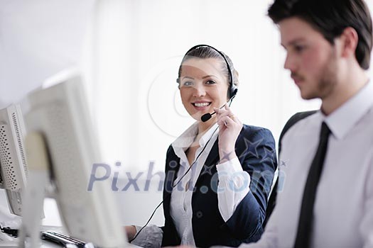 business people group with headphones giving support in help desk office to customers, manager giving training and education instructions business people group with headphones giving support in help desk office to customers, manager giving training and education instructions