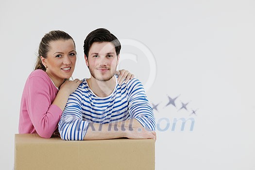 happy Young couple moving in new house happy Young couple moving in new house