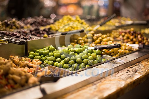 Olives on sale/display in a food market/grocery store Olives on sale/display in a food market/grocery store