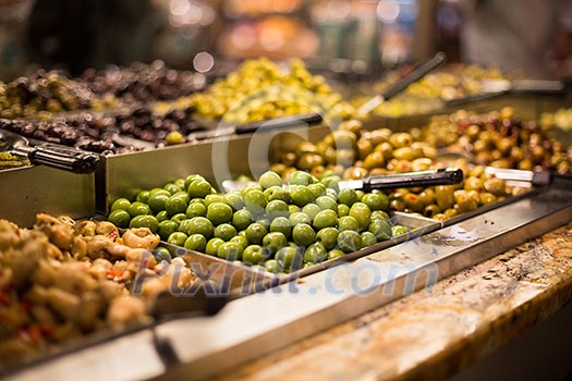 Olives on sale/display in a food market/grocery store