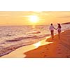 happy young romantic couple in love have fun on beautiful beach at beautiful summer day