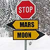 in  middle of the starway, mars and moon roadsign