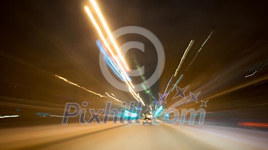 Night blurred city lights of streets and moving cars Night blurred city lights of streets and moving cars