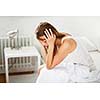 sick woman on bed concept of stomachache, headache, hangover, sleeplessness or insomnia