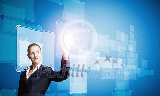 Young attractive businesswoman touching icon of digital screen