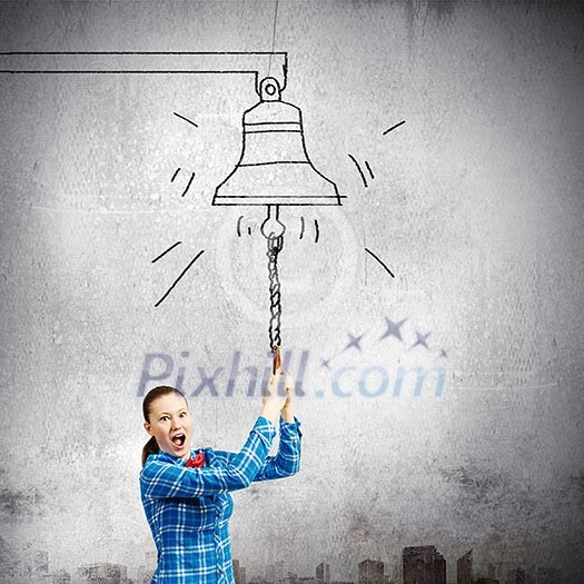 Young excited woman in casual ringing bell Young excited woman in casual ringing bell