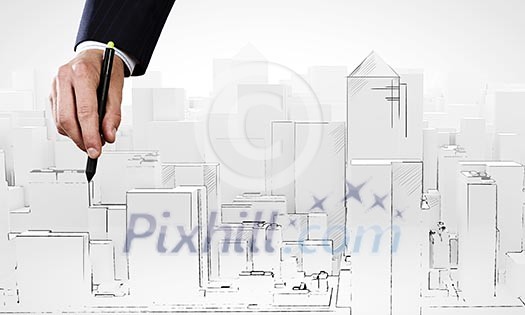 Close up of male hand drawing construction project Close up of male hand drawing construction project