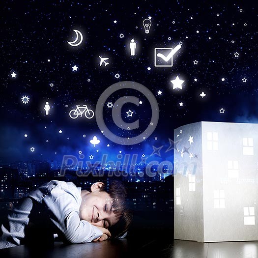 Cute little boy sleeping and dreaming about home Cute little boy sleeping and dreaming about home