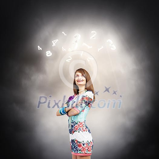 Young pretty woman standing under sun lights Young pretty woman standing under sun lights