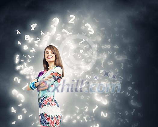 Young pretty woman standing under sun lights Young pretty woman standing under sun lights
