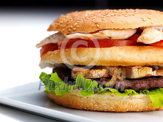 still life with fast food hamburger menu, french fries, soft drink and ketchup still life with fast food hamburger menu, french fries, soft drink and ketchup