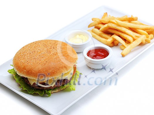 still life with fast food hamburger menu, french fries, soft drink and ketchup still life with fast food hamburger menu, french fries, soft drink and ketchup