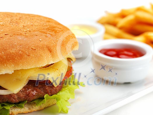 still life with fast food hamburger menu, french fries, soft drink and ketchup still life with fast food hamburger menu, french fries, soft drink and ketchup