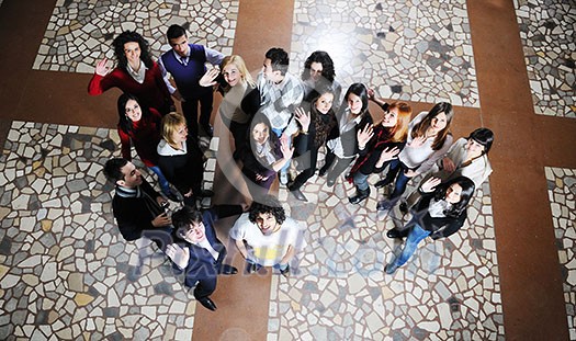 happy young student group posing at university school and classs indoor