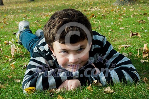 happy boy jumping in the park, joy, emotion happy boy jumping in the park, joy, emotion